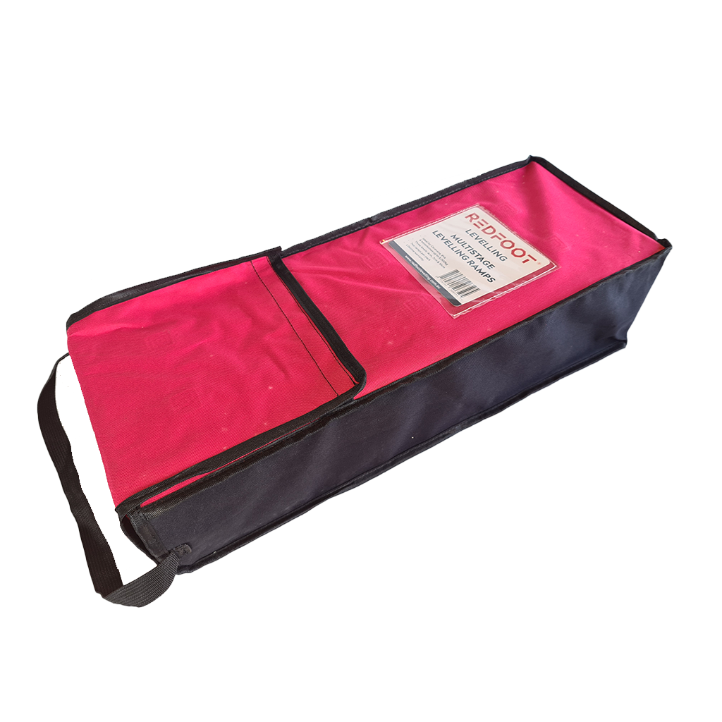 Redfoot Levelling - A pink and black Redfoot Levelling RV Multi Stage Levelling Ramps with a zipper, perfect for outrigger pads.