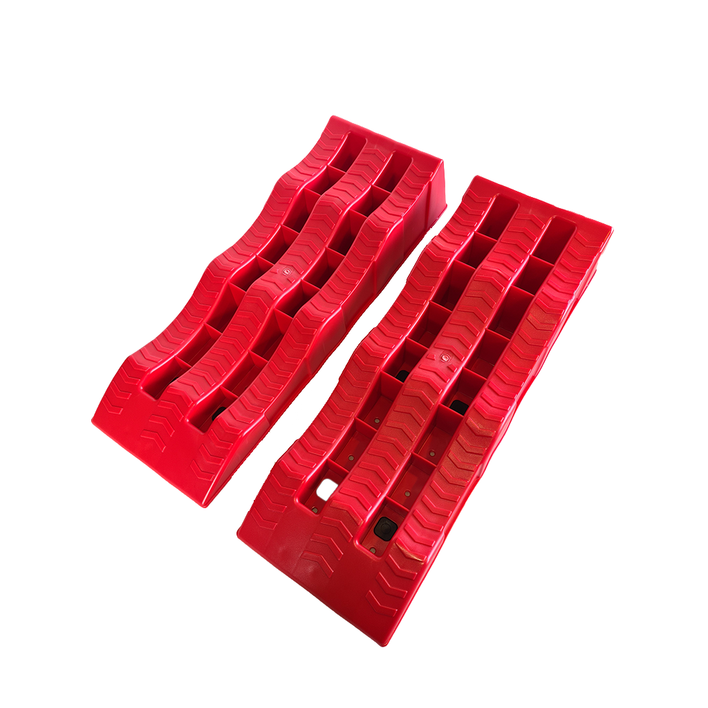Redfoot Levelling - A pair of Redfoot Levelling RV Multi Stage Levelling Ramps on a white background.